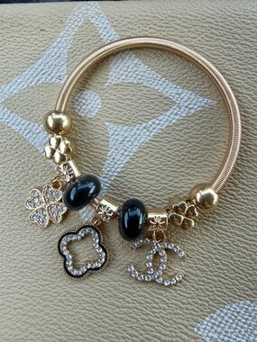 CC Lettered Gold-Tone Charm Bracelet with Black Beads and Crystal Accents